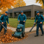 TCOS crew performing commercial fall cleanup with leaf removal in the Twin Cities
